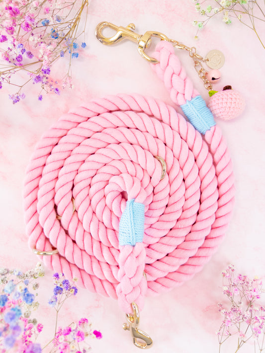 Our TAILWAGGER LEASH is a soft rope style dog leash in a pastel pink color made with 100% premium cotton.