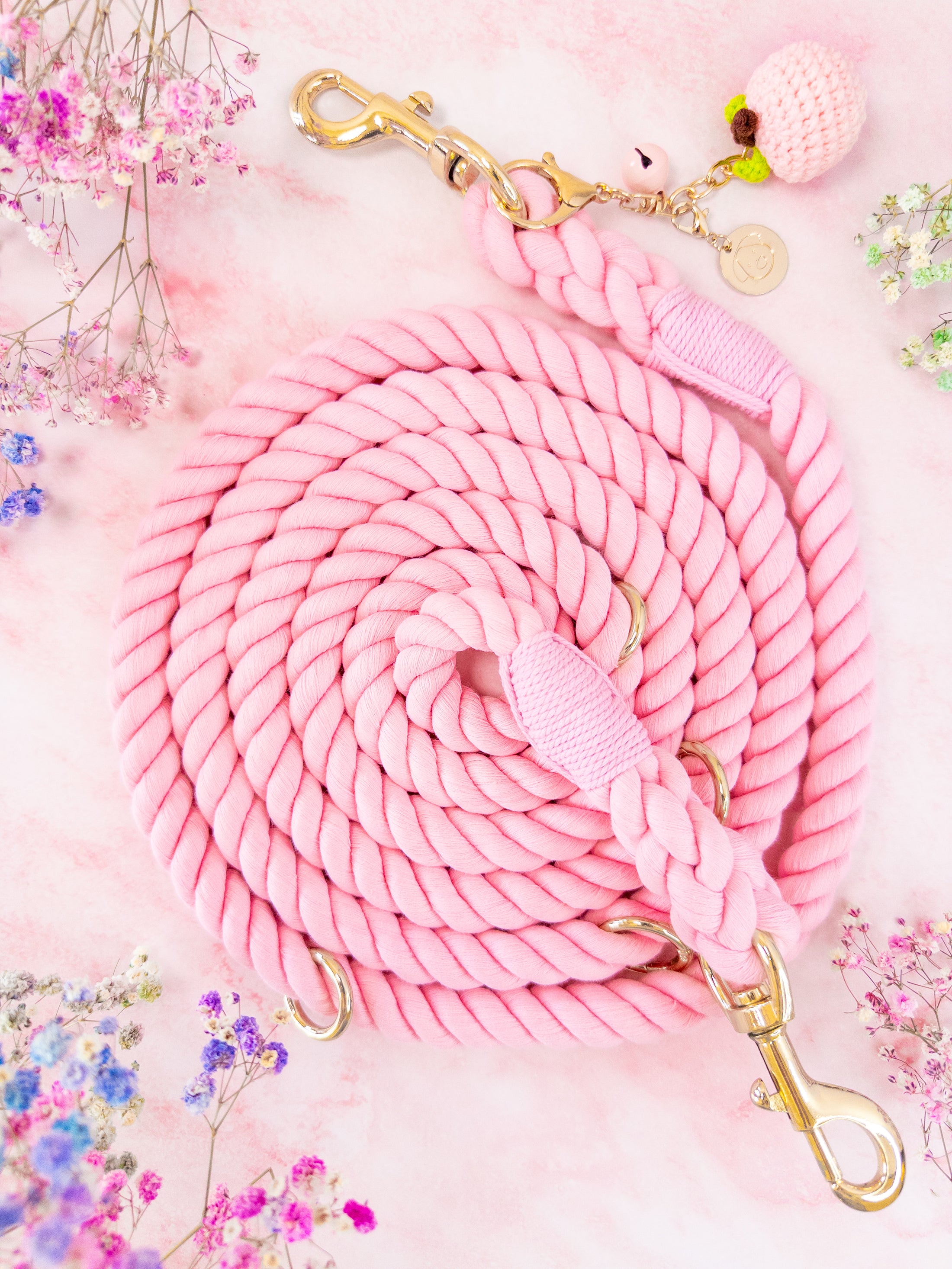 Our TAILWAGGER LEASH is a soft rope style dog leash in a pastel pink color made with 100% premium cotton.